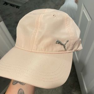 Blush pink Puma hat.
